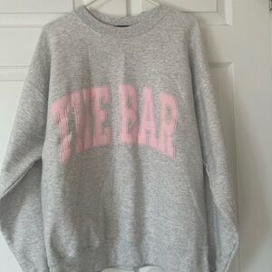 The Bar Gray Sweatshirt with Pink Lettering